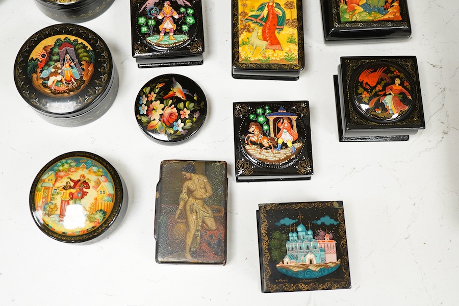 Twenty five Russian assorted lacquer pill and trinket boxes. Largest 10cm deep.